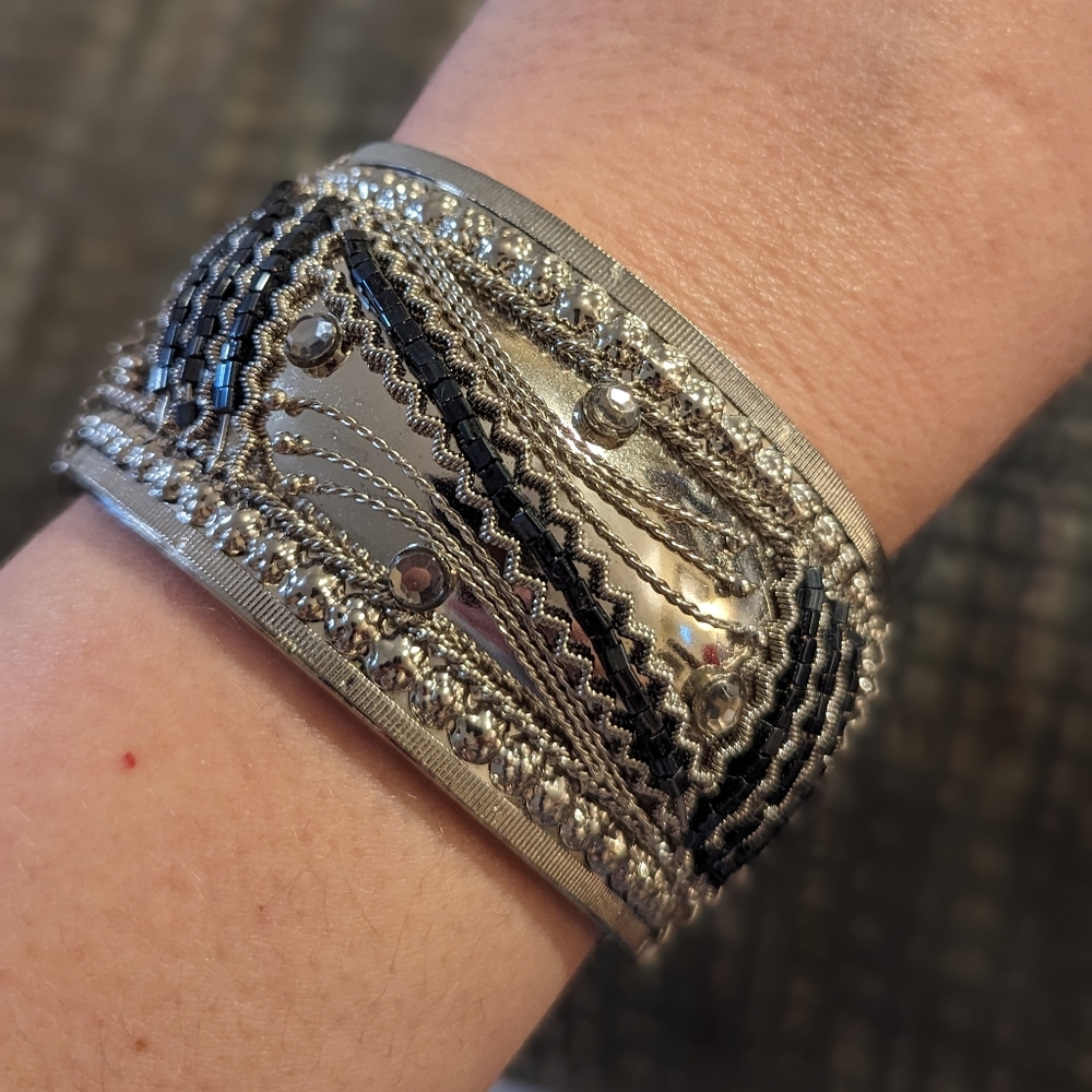 Vintage silver tone and blue metal cuff hinged bracelet costume jewelry